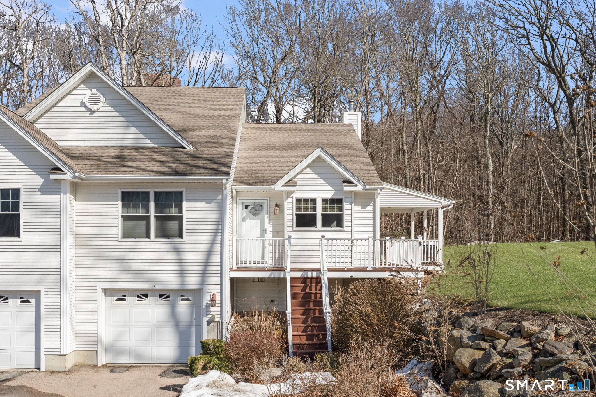 125 Murphy's Drive, Unit 125 Groton, CT 06340 - Photo 1 of 1 a front view of a house with a yard