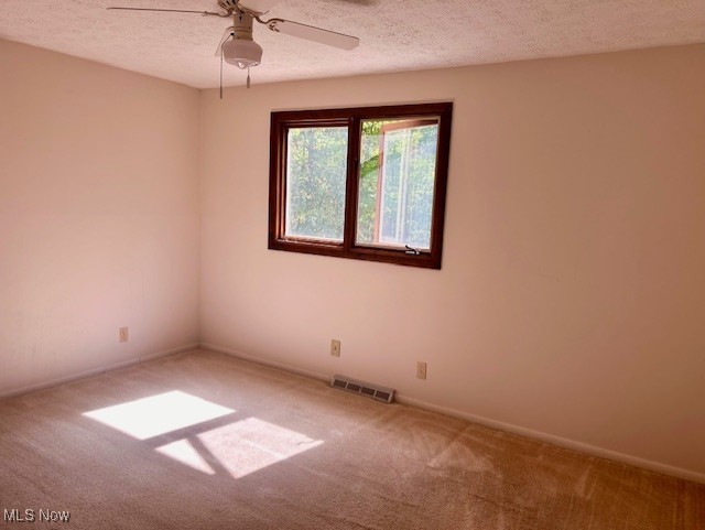 3422 Southern Road Richfield, OH 44286 - Photo 27 of 42 Carpeted bedroom featuring ceiling fan and a textured ceiling