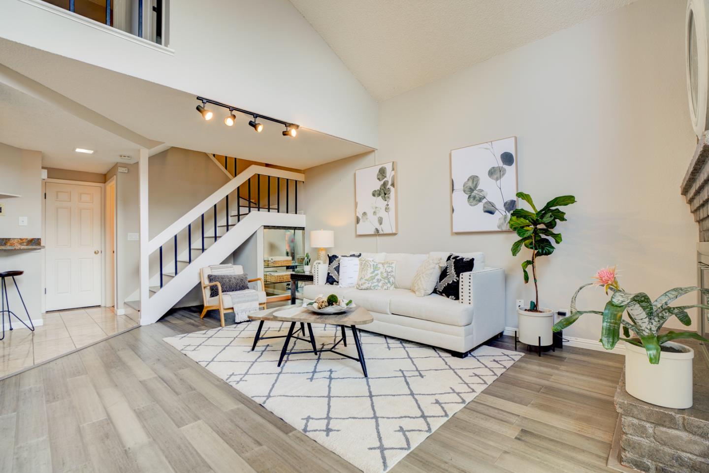 44 Redding Road Campbell, CA 95008 - Photo 2 of 51 a living room with furniture and wooden floor
