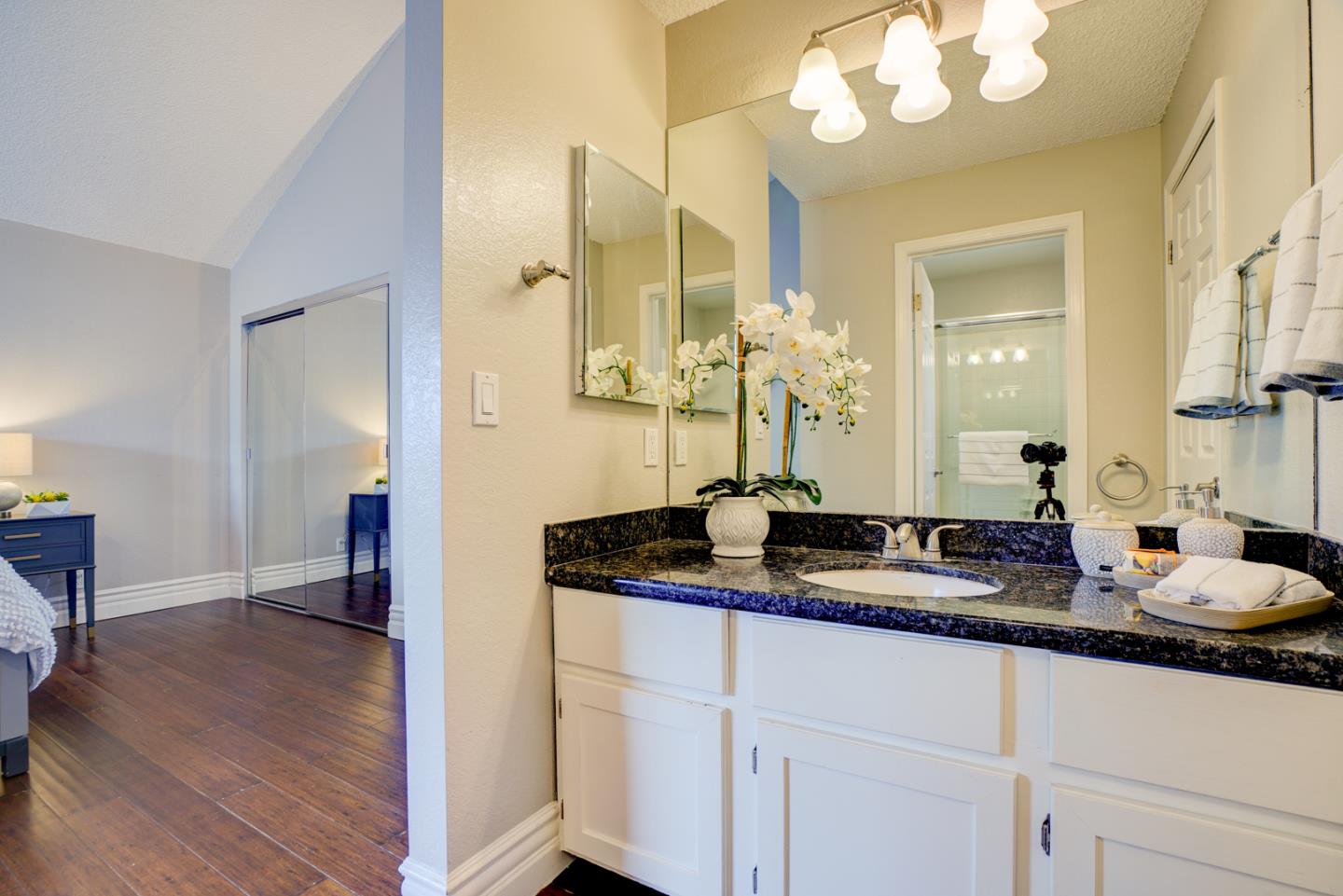 44 Redding Road Campbell, CA 95008 - Photo 27 of 51 a bathroom with a double vanity sink and a mirror