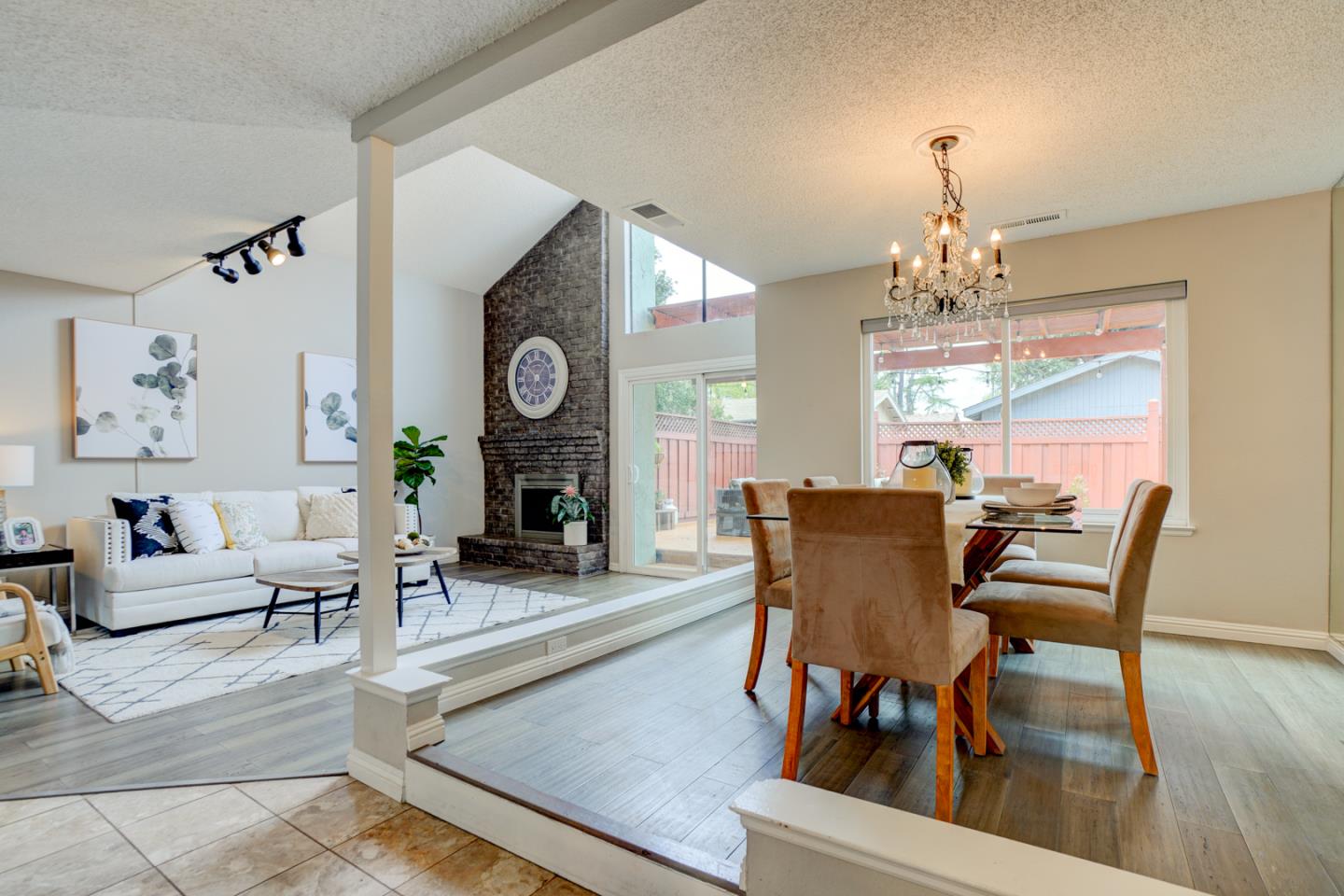 44 Redding Road Campbell, CA 95008 - Photo 4 of 51 a view of a dining room with furniture a chandelier and wooden floor