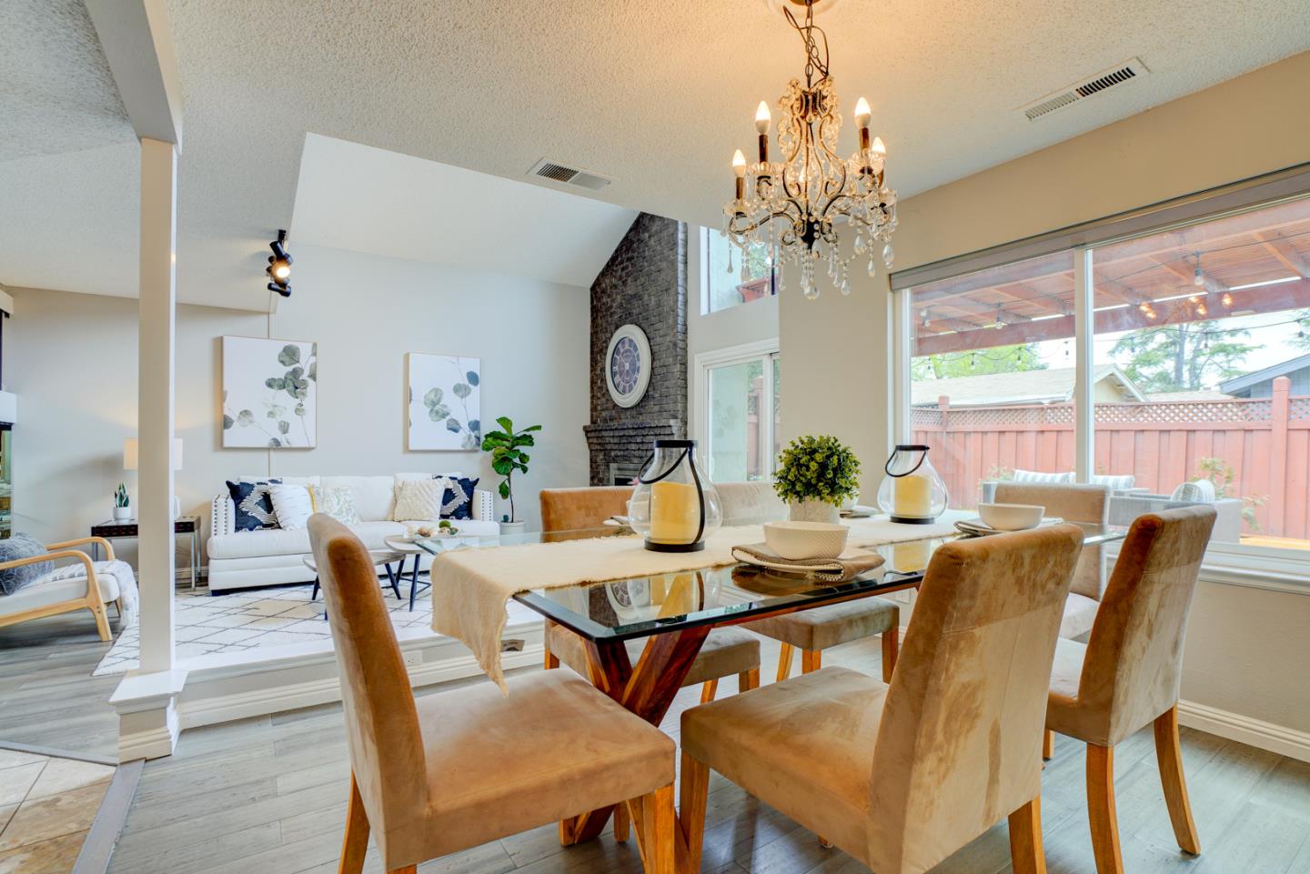 44 Redding Road Campbell, CA 95008 - Photo 5 of 51 a view of a dining room with furniture wooden floor and chandelier
