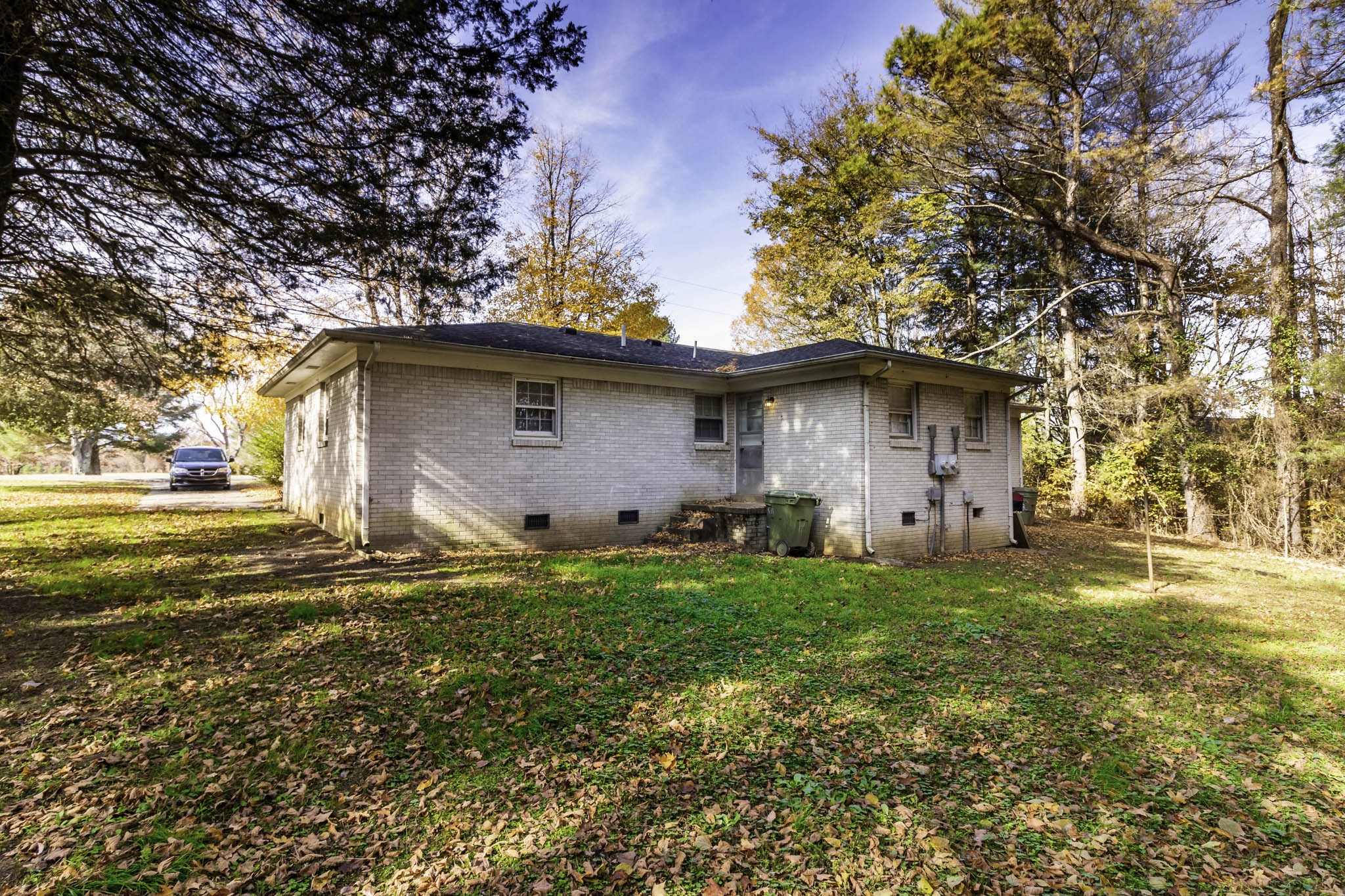 121 Glenn Springs Road Lawrenceburg, TN 38464 - Photo 17 of 17 a backyard of a house with lots of green space