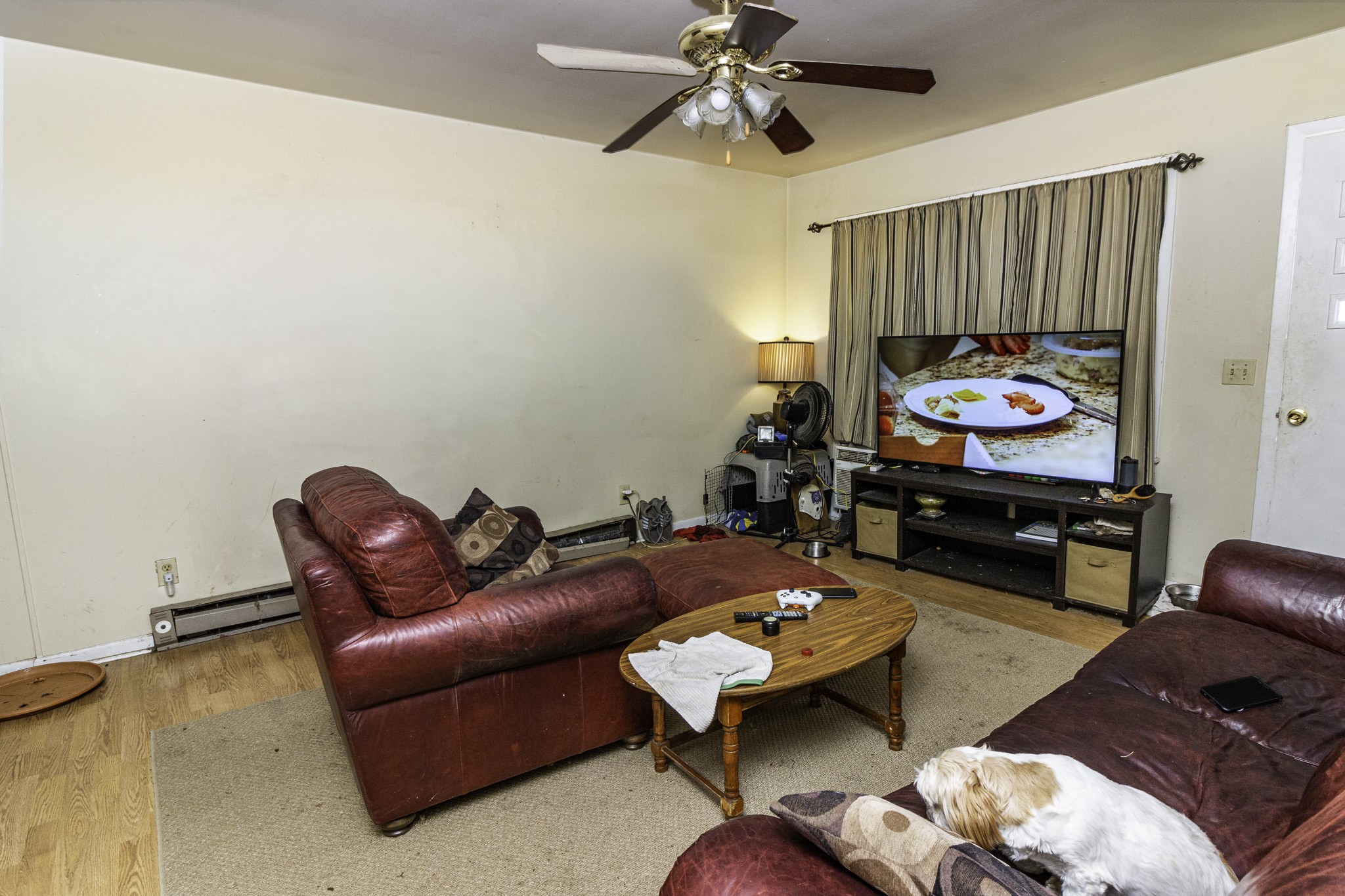 121 Glenn Springs Road Lawrenceburg, TN 38464 - Photo 9 of 17 a living room with furniture and a flat screen tv