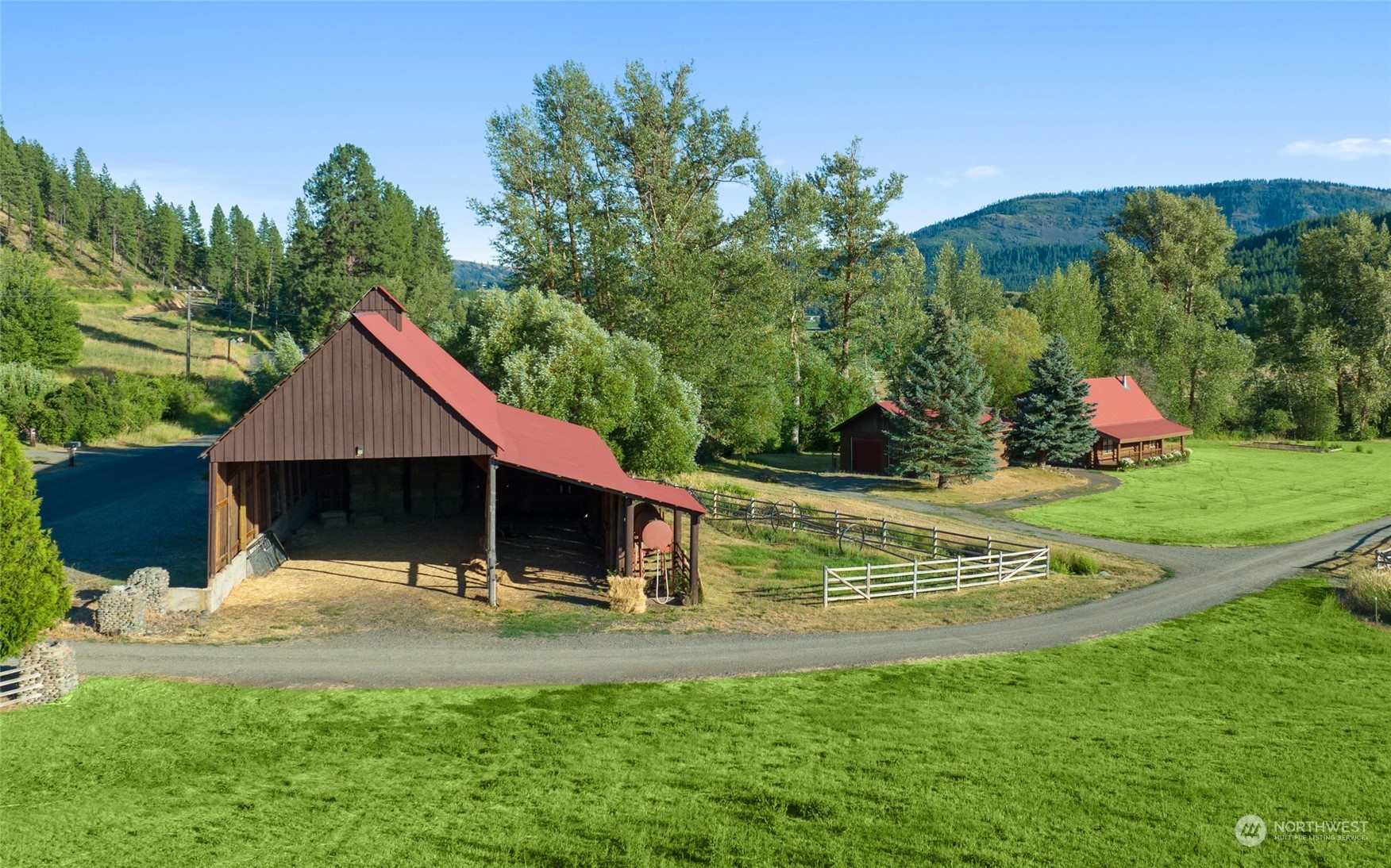3435 Teanaway Road Cle Elum, WA 98922 - Photo 11 of 33 a view of house with backyard and trees