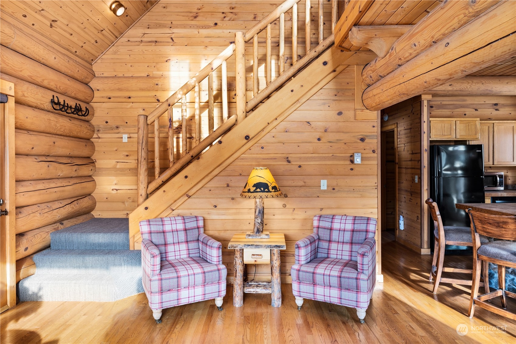 3435 Teanaway Road Cle Elum, WA 98922 - Photo 23 of 33 a living room with couches chairs and wooden floor