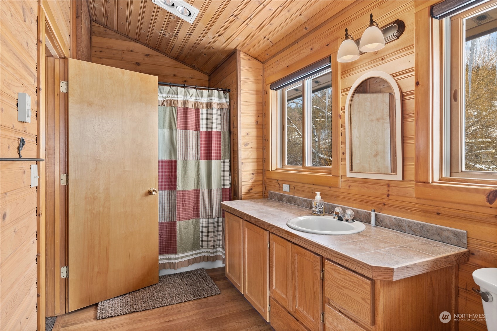 3435 Teanaway Road Cle Elum, WA 98922 - Photo 31 of 33 a bathroom with a sink a mirror and a shower