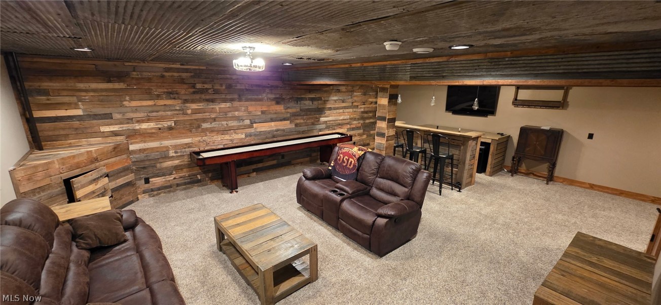 3989 Court Road Wakeman, OH 44889 - Photo 20 of 36 Game room with carpet floors, a bar, and wood ceiling