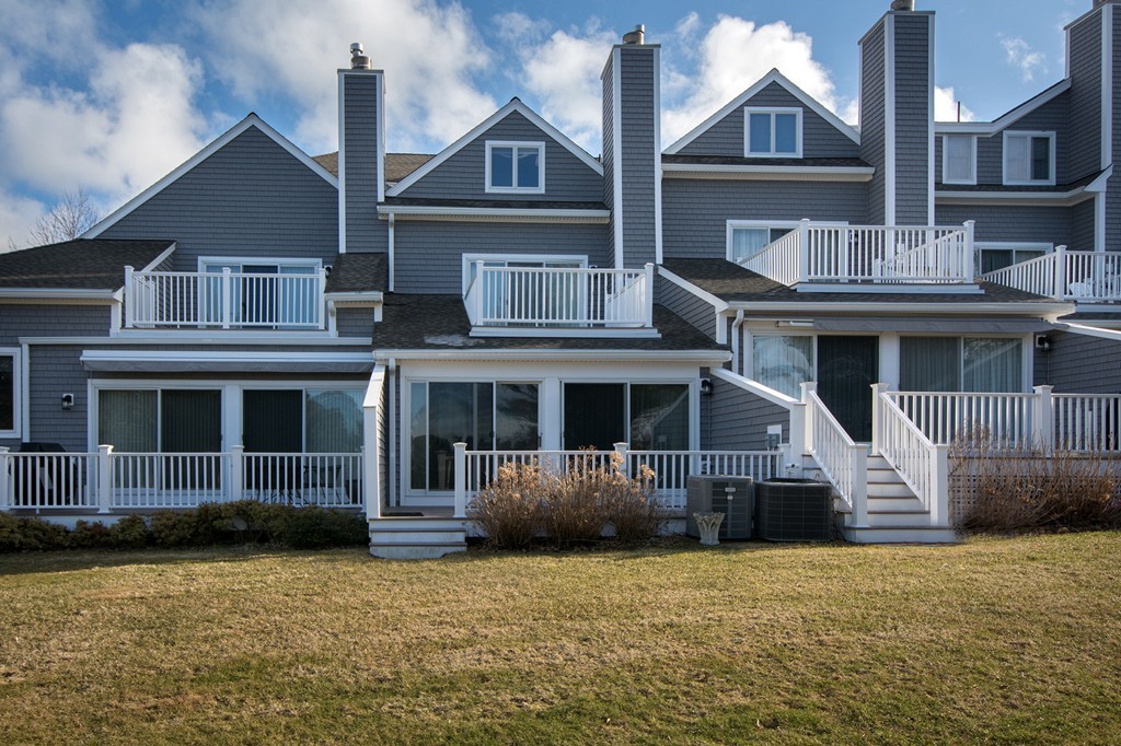 a front view of a house with garage