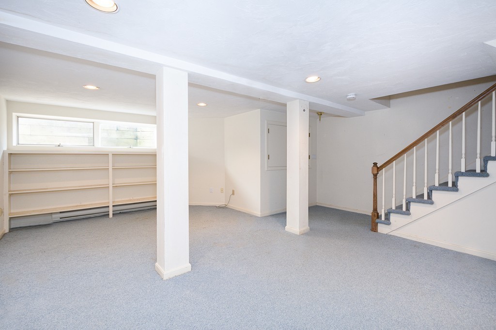 40 Driftway, Unit 13 Scituate, MA 02066 - Photo 25 of 29 a view of an empty room with a window