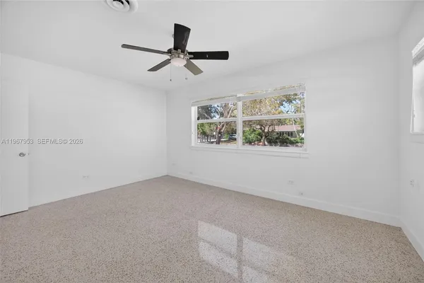 an empty room with windows