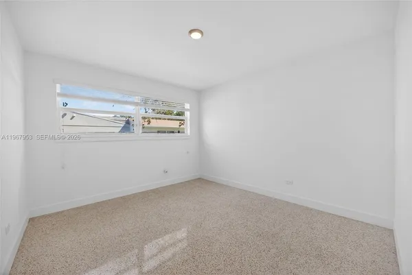 a view of a hallway with closet