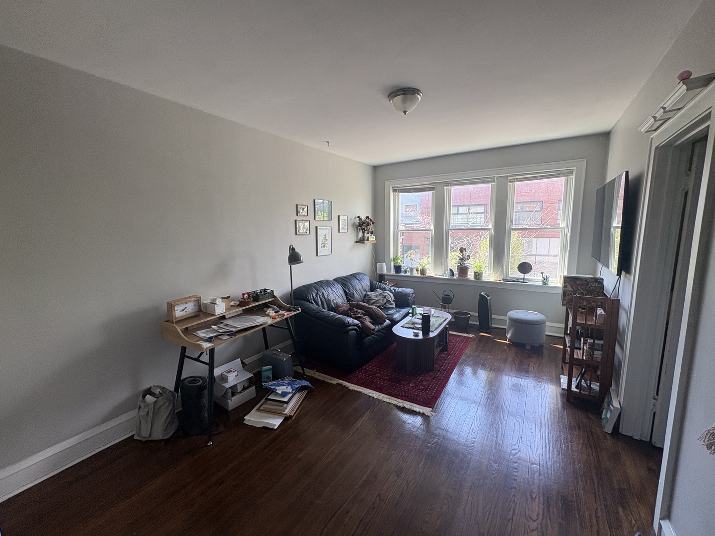 1529 Greenleaf Street Evanston, IL 60202 - Photo 13 of 15 a living room with furniture and wooden floor