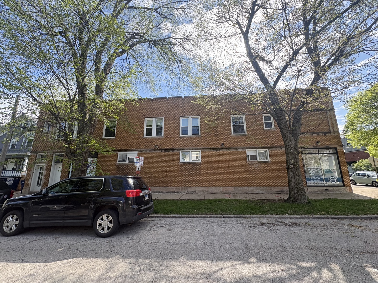 1529 Greenleaf Street Evanston, IL 60202 - Photo 2 of 15 a view of a car parked in front of a house