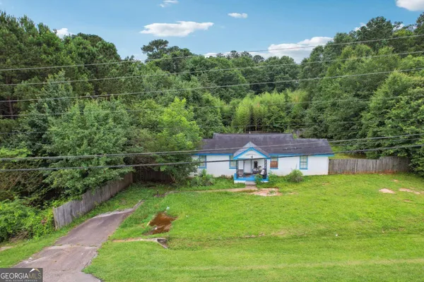 a house view with a garden space