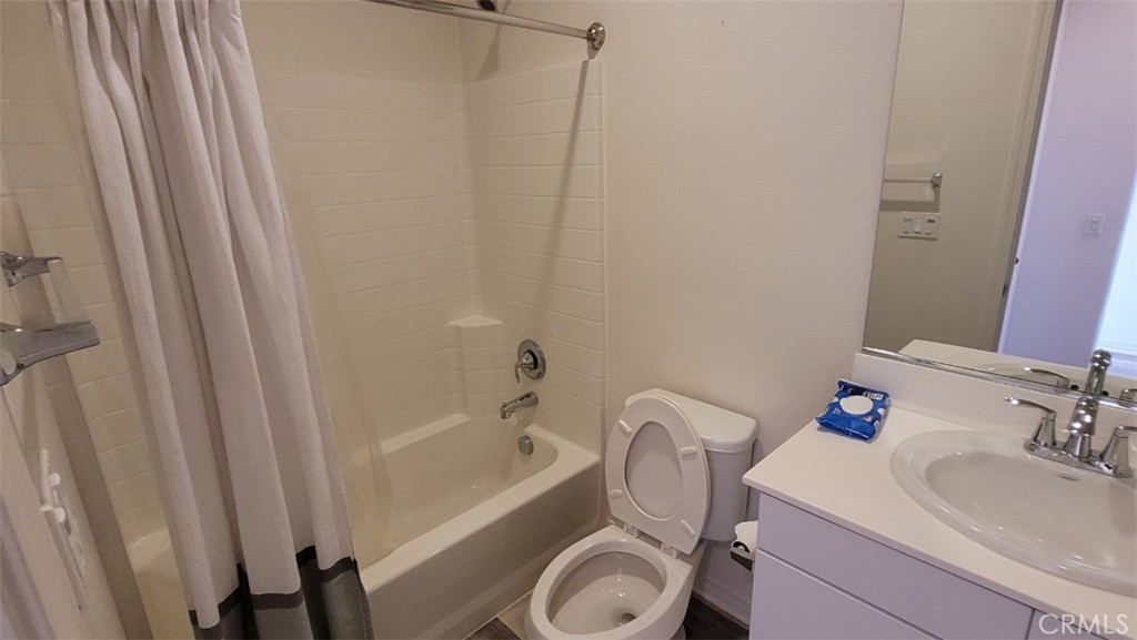 22056 Windham Way Saugus, CA 91350 - Photo 15 of 35 a bathroom with a sink a toilet and shower