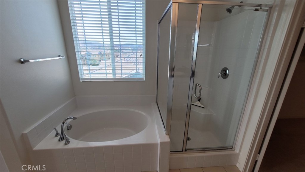 22056 Windham Way Saugus, CA 91350 - Photo 22 of 35 a white bath tub sitting next to a shower
