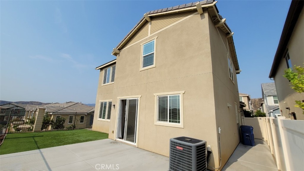 22056 Windham Way Saugus, CA 91350 - Photo 32 of 35 a front view of a house with a yard