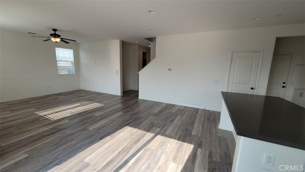 22056 Windham Way Saugus, CA 91350 - Photo 6 of 35 wooden floor in an empty room with a window