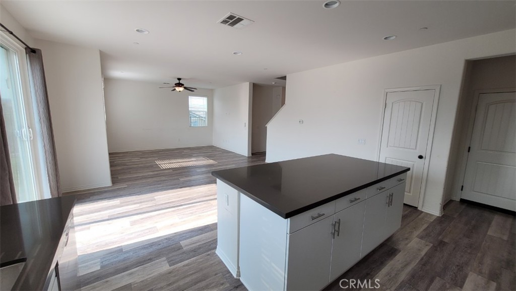 22056 Windham Way Saugus, CA 91350 - Photo 10 of 35 a kitchen with a sink and wooden floor