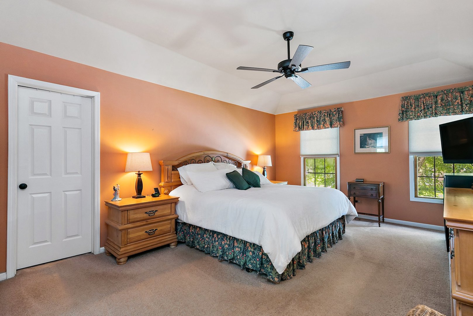 1010 Wakefield Drive Elgin, IL 60120 - Photo 13 of 32 a bedroom with a bed dresser and a flat tv screen