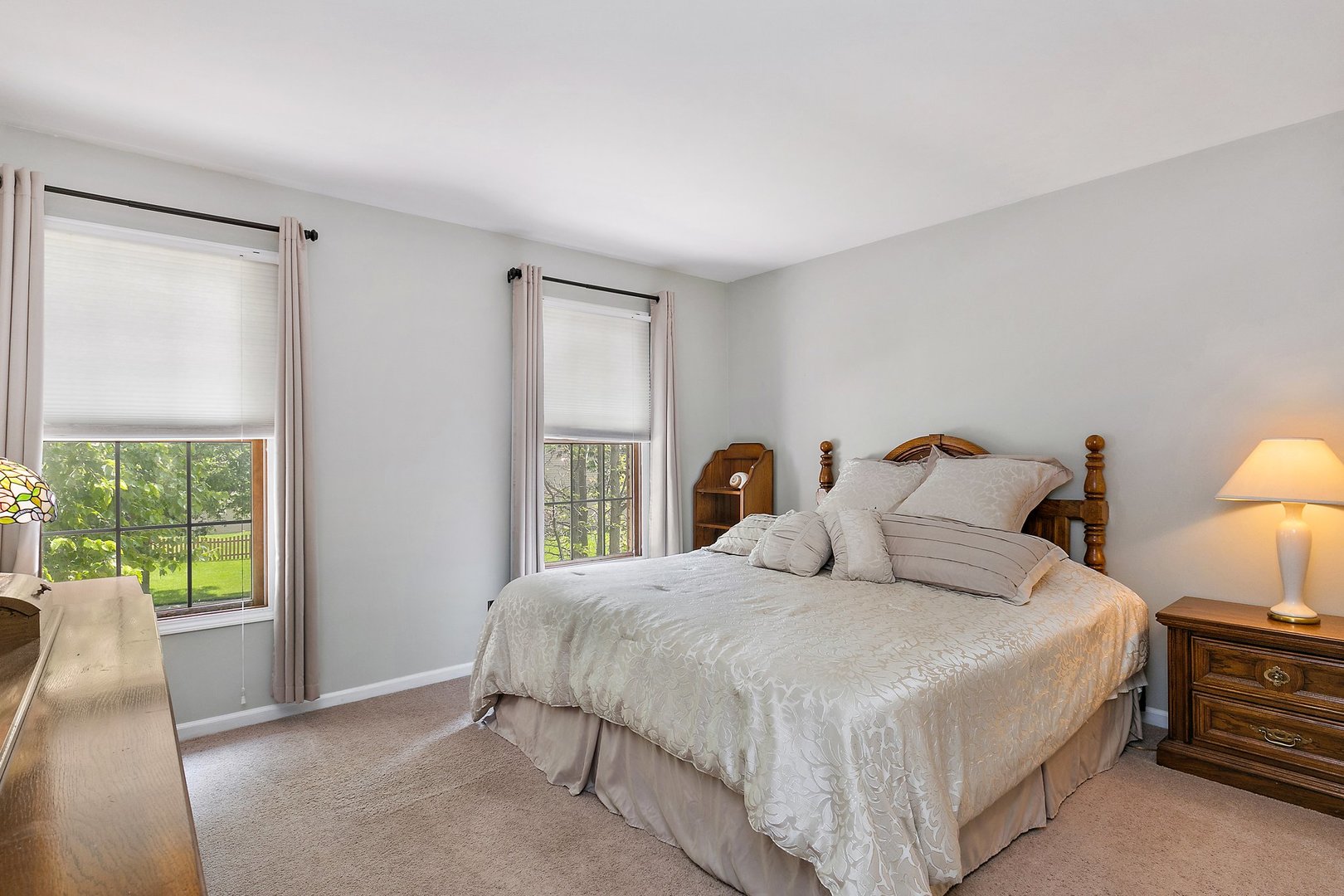 1010 Wakefield Drive Elgin, IL 60120 - Photo 16 of 32 a bedroom with a bed and a window
