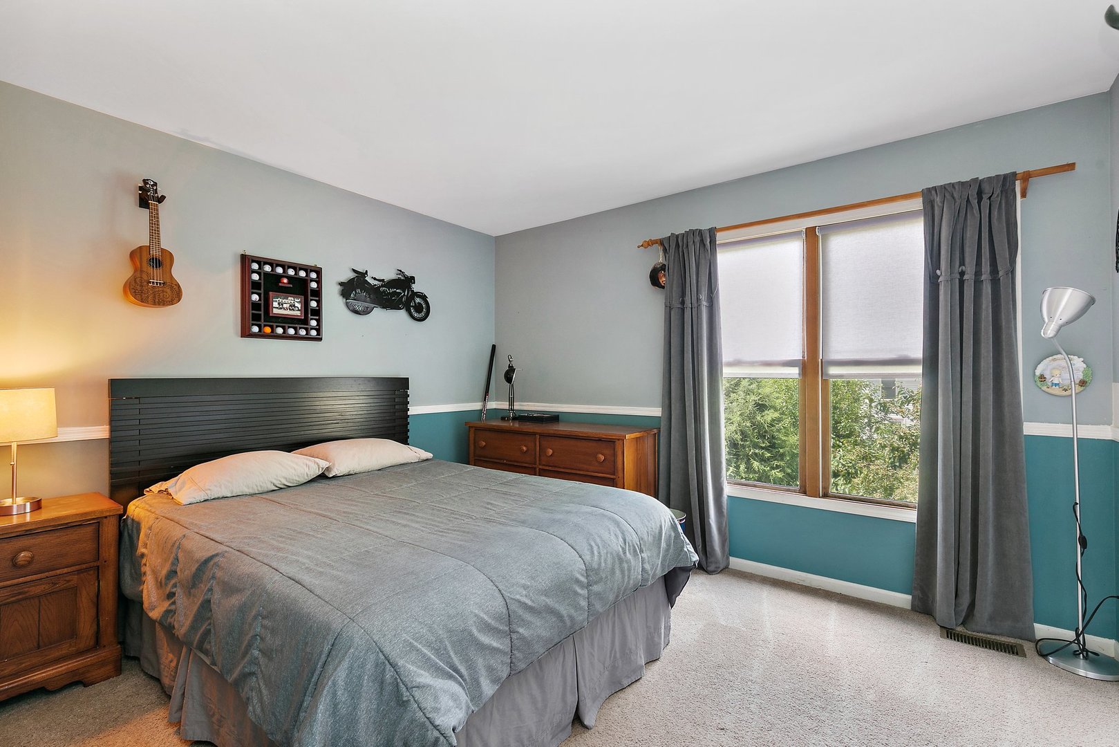 1010 Wakefield Drive Elgin, IL 60120 - Photo 18 of 32 a bedroom with a bed and window