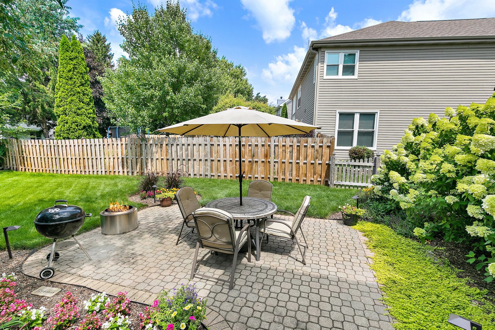 1010 Wakefield Drive Elgin, IL 60120 - Photo 27 of 32 a view of a patio with furniture and garden