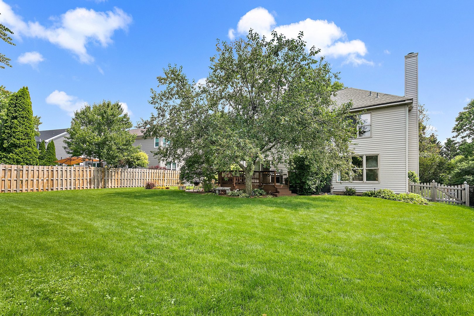 1010 Wakefield Drive Elgin, IL 60120 - Photo 29 of 32 a view of a trees in a yard