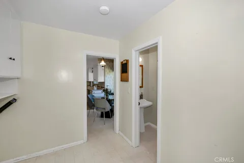 a view of a kitchen and a dining area a kitchen