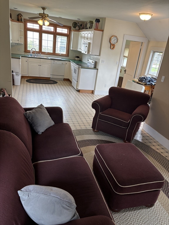 577 County Street Taunton, MA 02780 - Photo 5 of 23 a living room with furniture and a couch