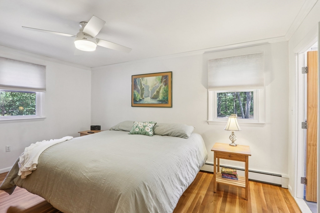 196 Hudson Road Stow, MA 01775 - Photo 12 of 31 a bedroom with a bed and a window