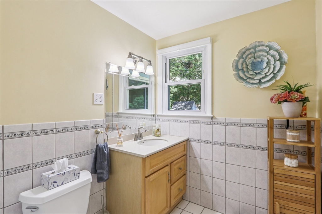 196 Hudson Road Stow, MA 01775 - Photo 14 of 31 a bathroom with a sink and a mirror