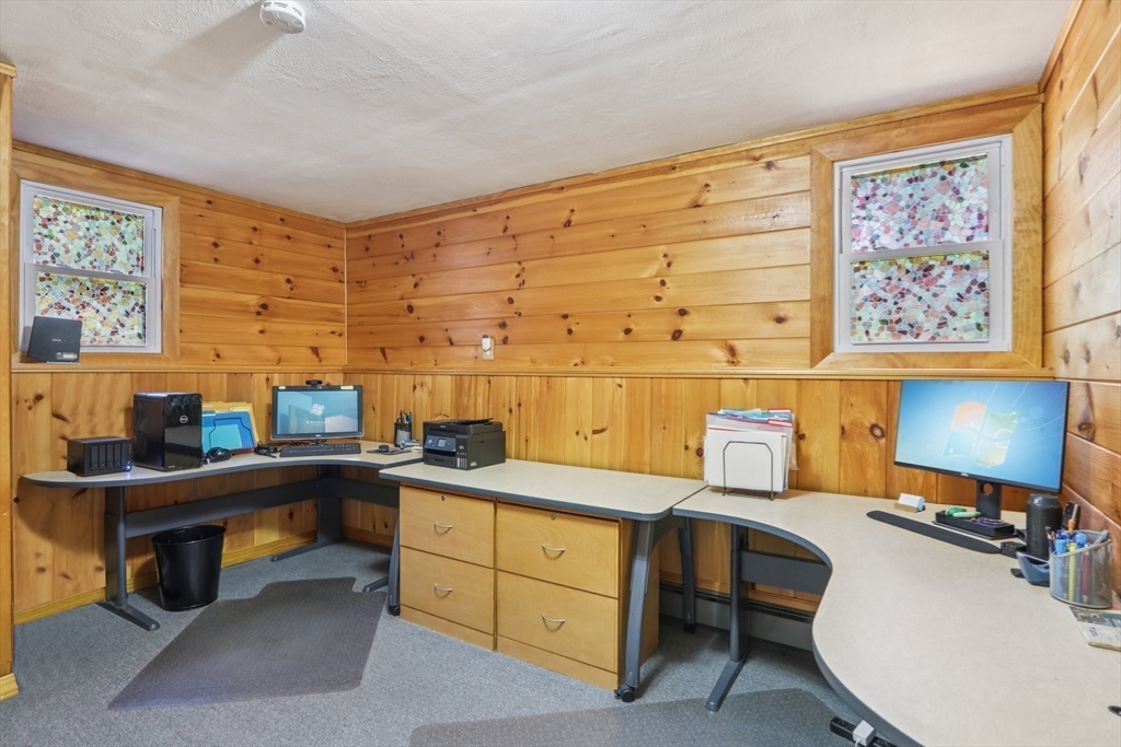 196 Hudson Road Stow, MA 01775 - Photo 21 of 31 a room with a couch and a table in it