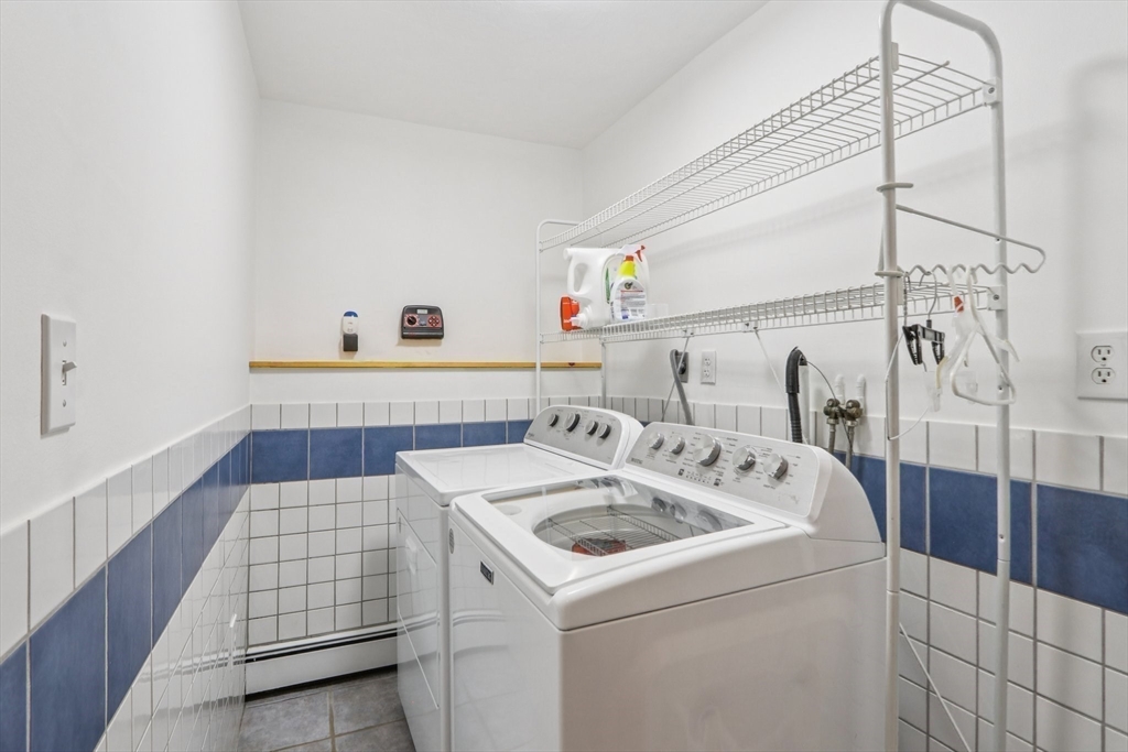 196 Hudson Road Stow, MA 01775 - Photo 22 of 31 a utility room with dryer and washer
