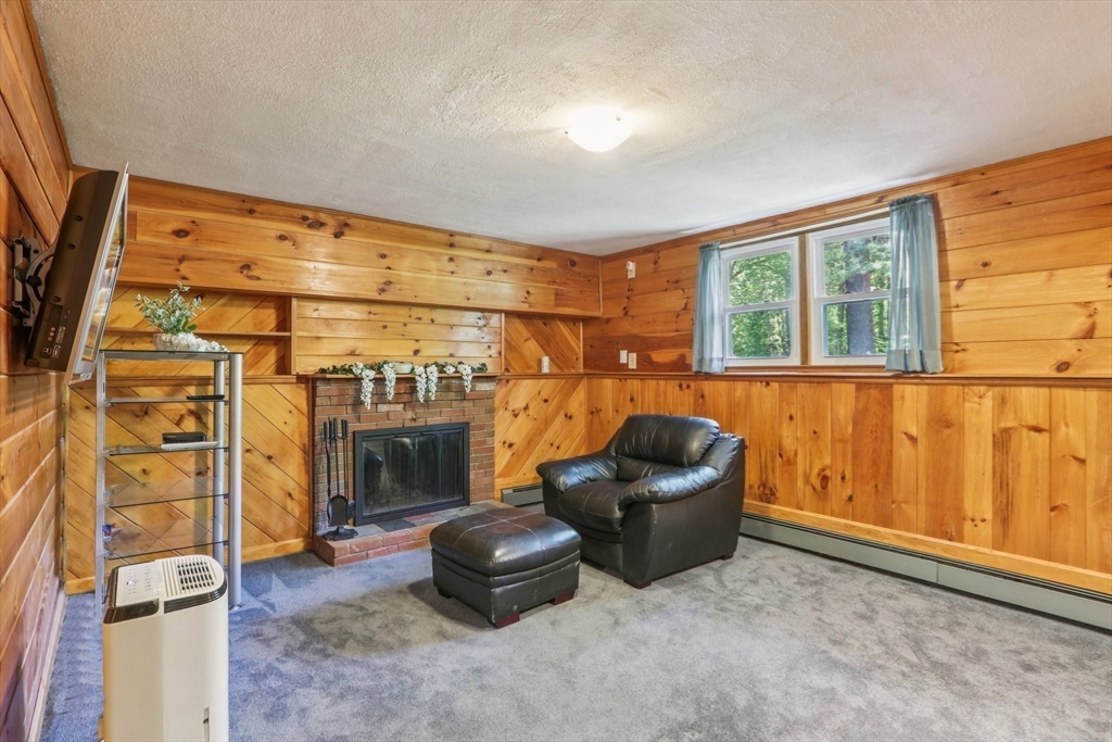196 Hudson Road Stow, MA 01775 - Photo 25 of 31 an entryway and livingroom with furniture