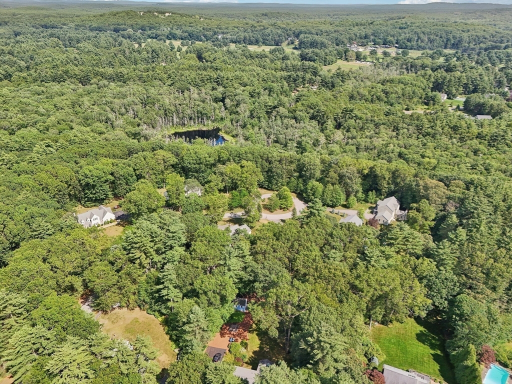 196 Hudson Road Stow, MA 01775 - Photo 29 of 31 an aerial view of residential houses with outdoor space and trees