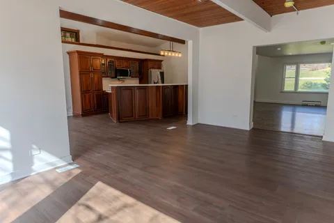 a view of a kitchen cabinets and a stove