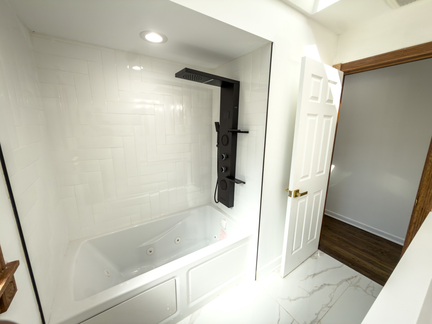 888 Woodstock Road Olympia Fields, IL 60461 - Photo 20 of 30 a bathroom with a bathtub and a shower