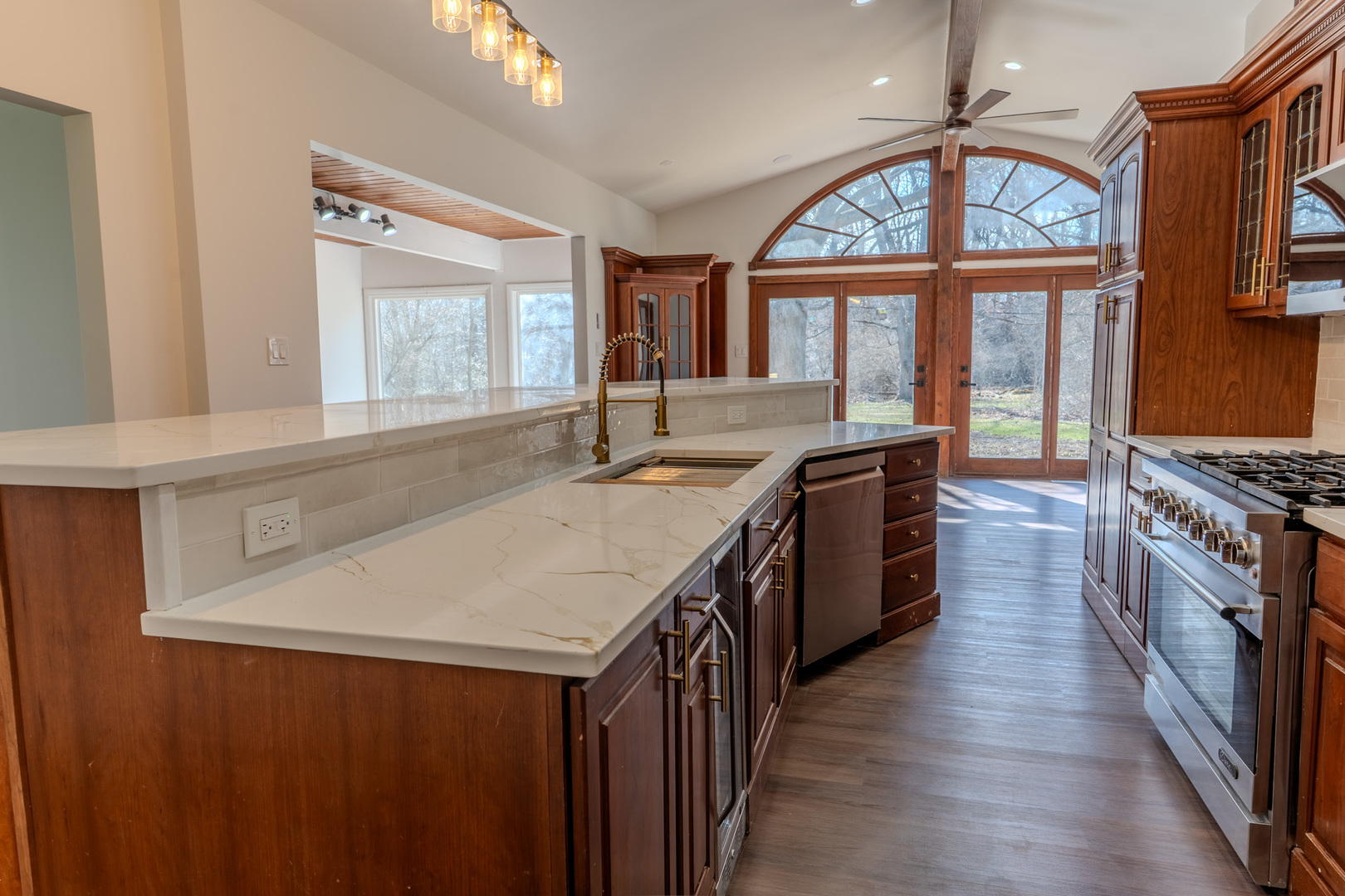 888 Woodstock Road Olympia Fields, IL 60461 - Photo 10 of 30 a kitchen with stainless steel appliances granite countertop a sink and a stove