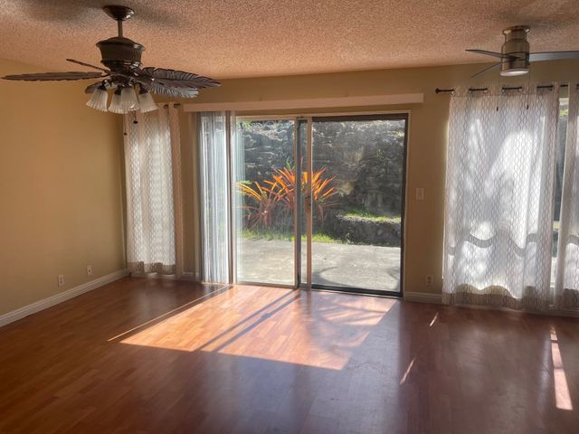 a view of a room with a large window