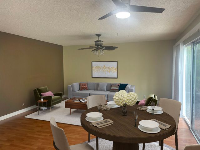 a view of a dining room with furniture