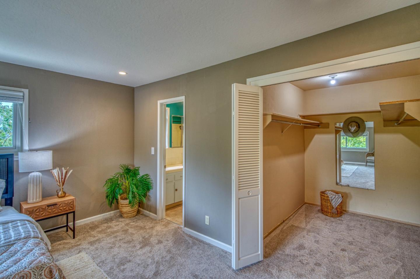 504 Cuesta Drive Aptos, CA 95003 - Photo 28 of 76 a living room with furniture and a potted plant