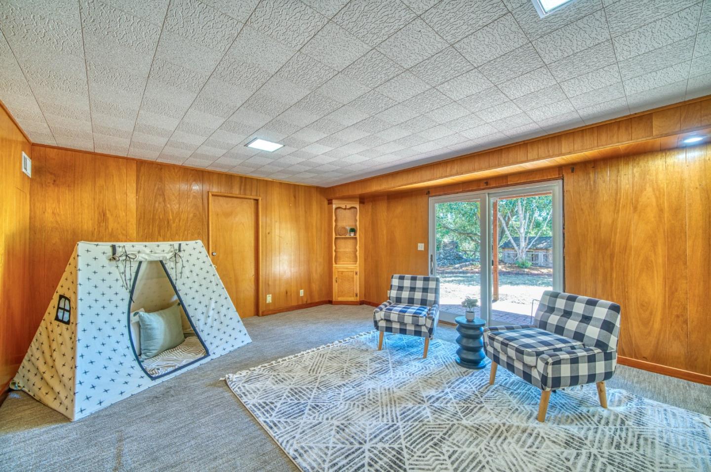 504 Cuesta Drive Aptos, CA 95003 - Photo 39 of 76 a living room with furniture and a large window