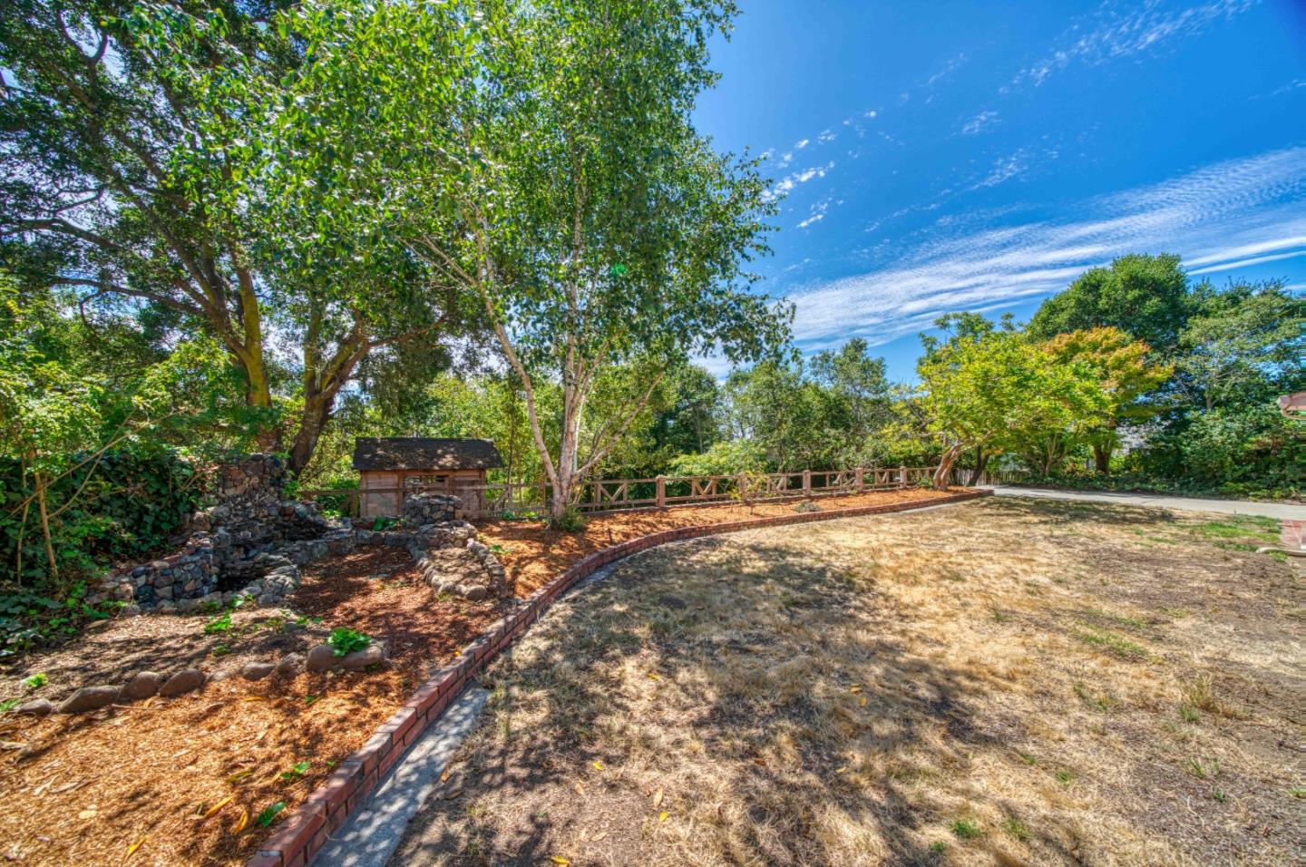 504 Cuesta Drive Aptos, CA 95003 - Photo 54 of 76 a view of a yard with plants and trees
