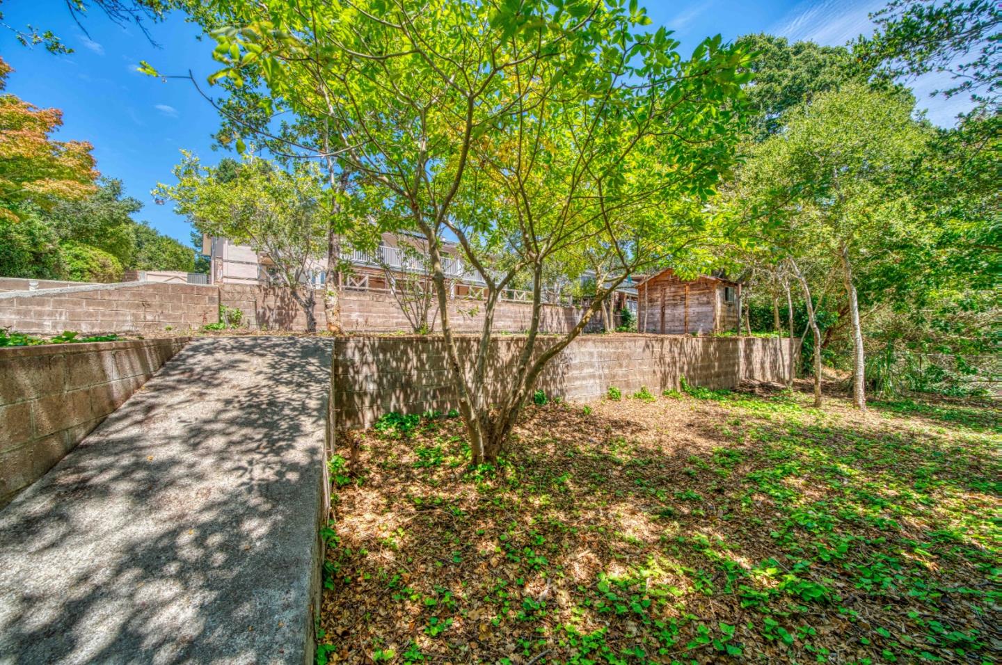 504 Cuesta Drive Aptos, CA 95003 - Photo 60 of 76 a front view of a house with a yard