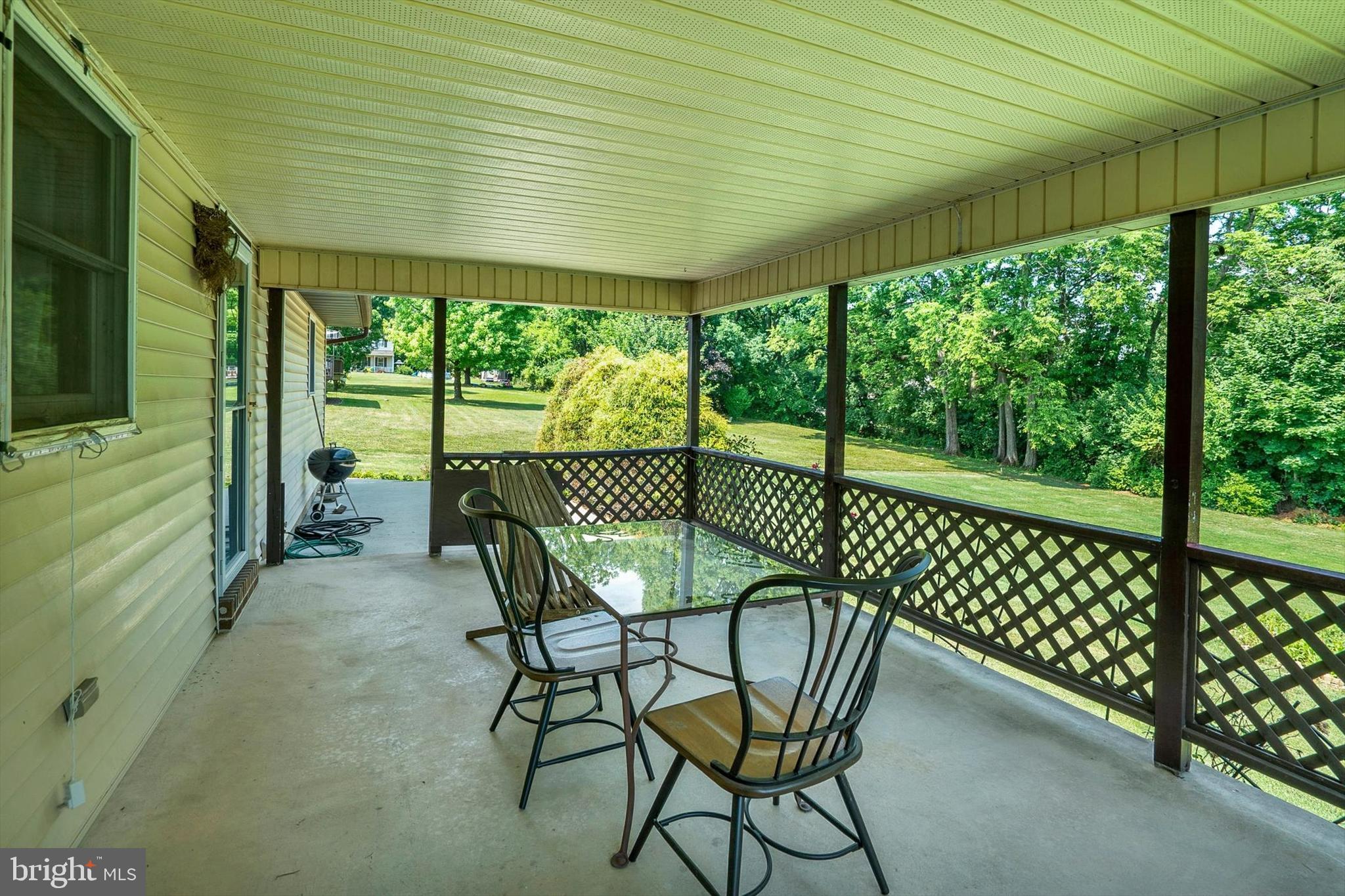 619 Calco Avenue Sinking Spring, PA 19608 - Photo 20 of 22 Lovely covered patio with concrete patio adjacent