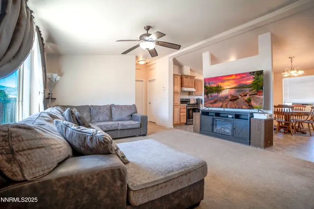 a view of a hallway with wooden staircase
