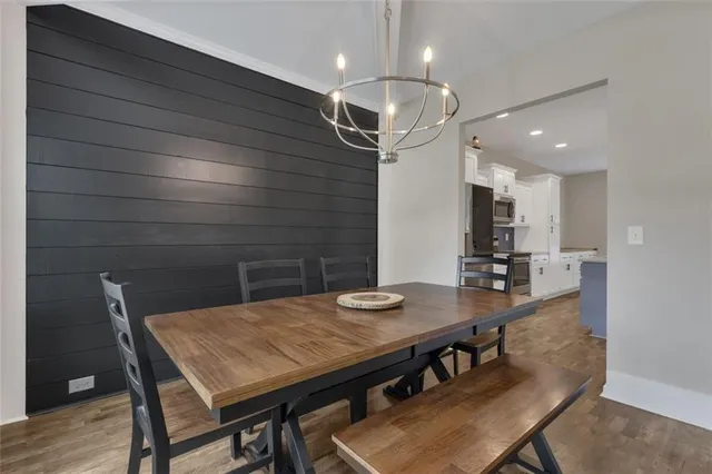 a view of a dining room with furniture