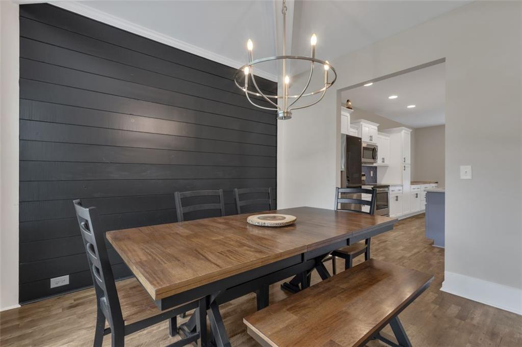 313 Lucy Lane Carrollton, GA 30117 - Photo 4 of 46 a view of a dining room with furniture